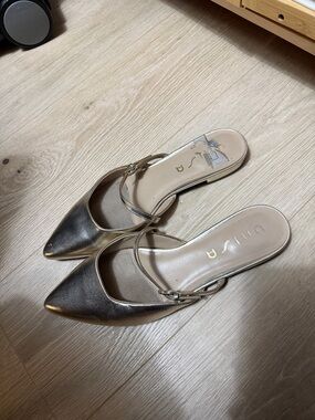 Unisa Metallic Gold Pointed Toe Slip-On Mules with Thin Cross Strap